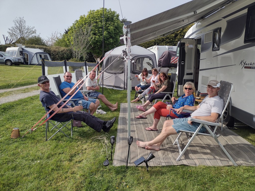 Large family size pitches for large motorhomes, family enjoying a seasonal holiday pitch at Trethiggey Holiday Park in Newquay Cornwall