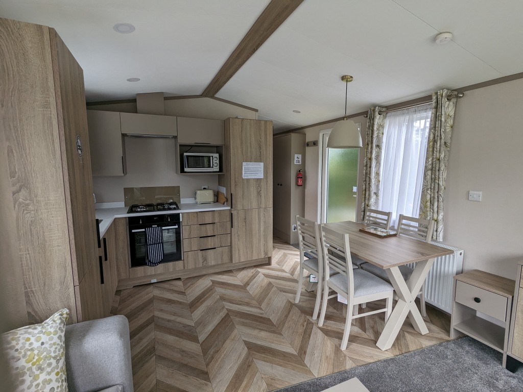 Large kitchen and dining area in the static caravan holiday rental Newquay Cornwall