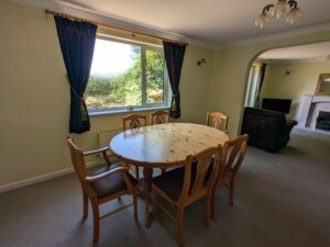 holiday let in Newquay Cornwall, Trethiggey Holiday Park in Newquay, cottage, annex, holiday rental, dining area, table, chairs, family room.